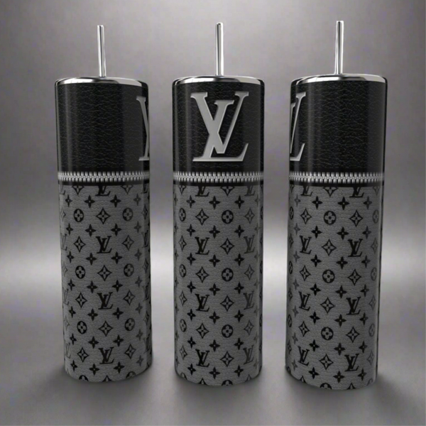 Three Louis V 20oz Skinny Tumblers by Kreative Kreationz, featuring a sleek black upper texture with gray "LV" logo patterns, elegantly stand on a reflective gray surface. These eco-friendly luxury cylindrical bottles with straws blend style and sustainability seamlessly.