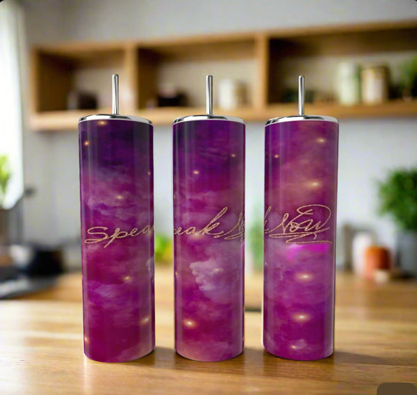 Three tall Kreative Kreationz Speak Now 20oz tumblers with straws feature a purple and pink gradient stainless steel design and gold script. Arranged on a wooden table, they stand out against blurred shelves and plants in the background.