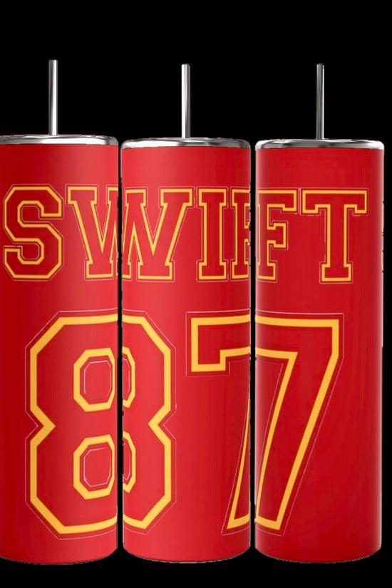 The Taylor Swift | 87 Chiefs 20oz Skinny Tumbler by Kreative Kreationz features three red tumblers with metallic straws, each showcasing bold yellow text: one reads 