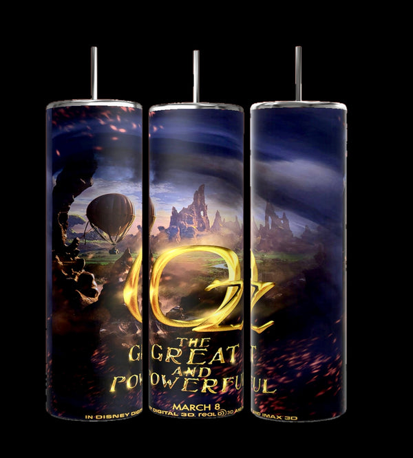 Kreative Kreationz's Wizard of Oz 20oz Tumblers feature eco-friendly, vertical designs with stainless steel artwork: a hot air balloon, fantasy landscapes with rocky spires, and glowing embers, all centered around the iconic movie title.