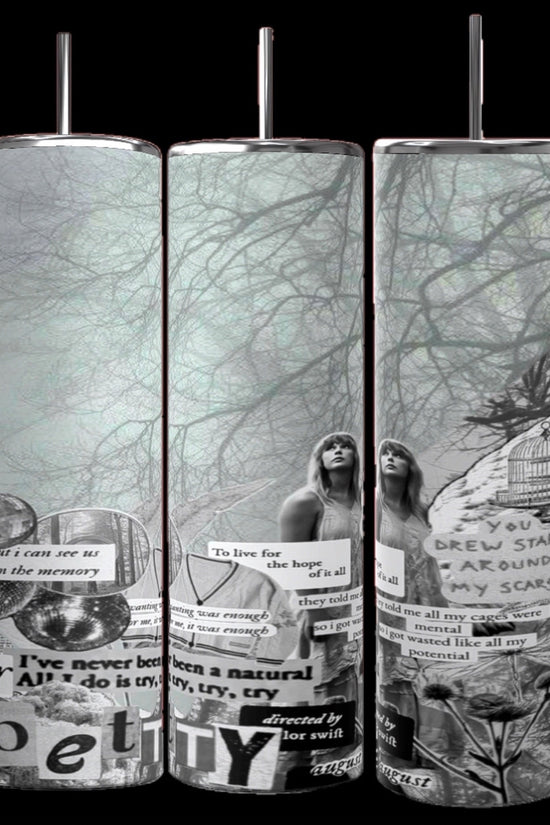 Three Folklore Taylor Swift 20oz Skinny Tumblers from Kreative Kreationz with monochromatic collage artwork depicting a forest background, intertwined branches, and cut-out text fragments featuring various quotes. Two partial portraits of a person are visible among the text and background imagery. Each tumbler includes a spill-proof lid and reusable straw.
