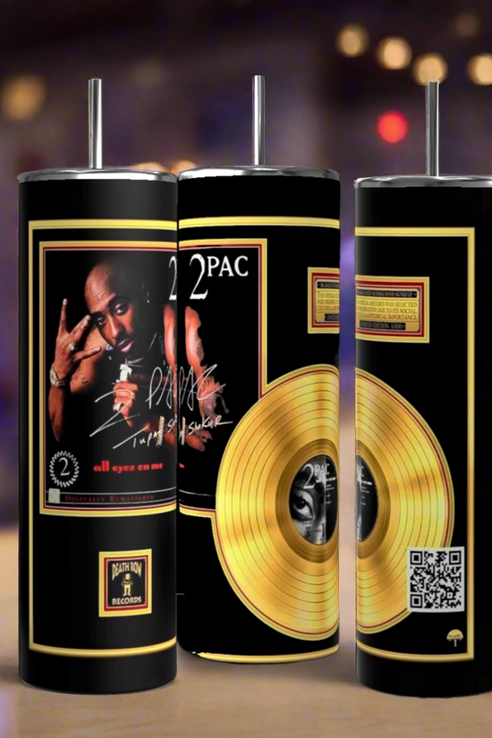 Kreative Kreationz offers three black stainless steel drinkware tumblers featuring album art and gold records. The 2Pac 20oz Tumbler showcases someone making a hand gesture, gold record graphics, and QR codes on a blurred blue-lit background.