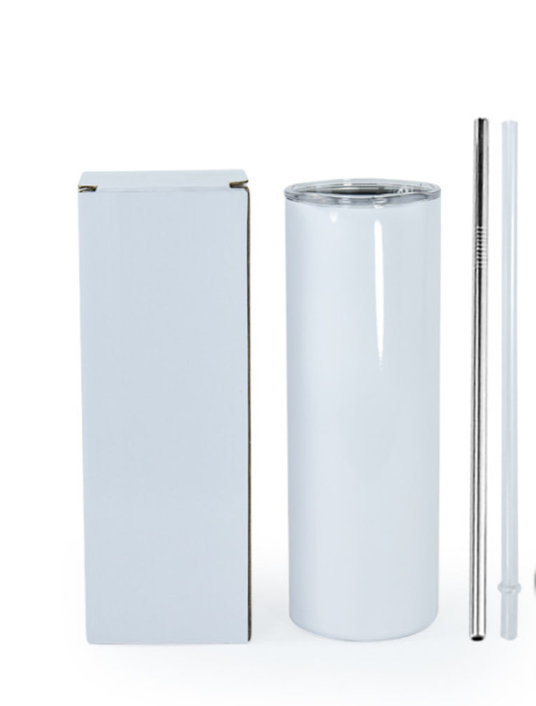 The Kreative Kreationz Outer Banks OBX 20oz tumbler, featuring a sleek white stainless steel design and spill-proof lid, is elegantly showcased beside a white box. The set includes a reusable metal straw and cleaner, beautifully arranged against a pristine white background.