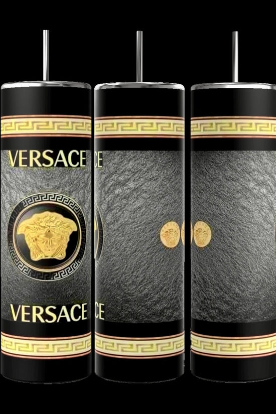 Three dark blue cylindrical tumblers, inspired by the luxury GUCCI Diana design and crafted by Kreative Kreationz, each featuring a textured pattern. These elegant tumblers boast prominent gold and red buckle designs, include a reusable straw, and flaunt a sleek, minimalistic aesthetic against a dark blue background. Each tumbler has an impressive 20 oz capacity.
