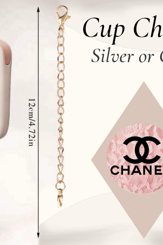 A gold cup charm from Kreative Kreationz, the Chanel Pink Charm Dangle, features a pink round pendant with the Chanel logo. Shown hanging from a mug with a lobster clasp silver chain. Text: “Cup Charm, Silver or Gold, 12cm/4.72in.”.