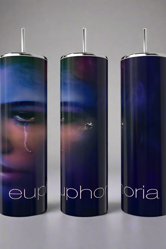 Three tall, slender Kreative Kreationz Euphoria Tumblers with silver lids and straws. Each stainless steel tumbler showcases a dark portrait on a deep blue-purple gradient, with 
