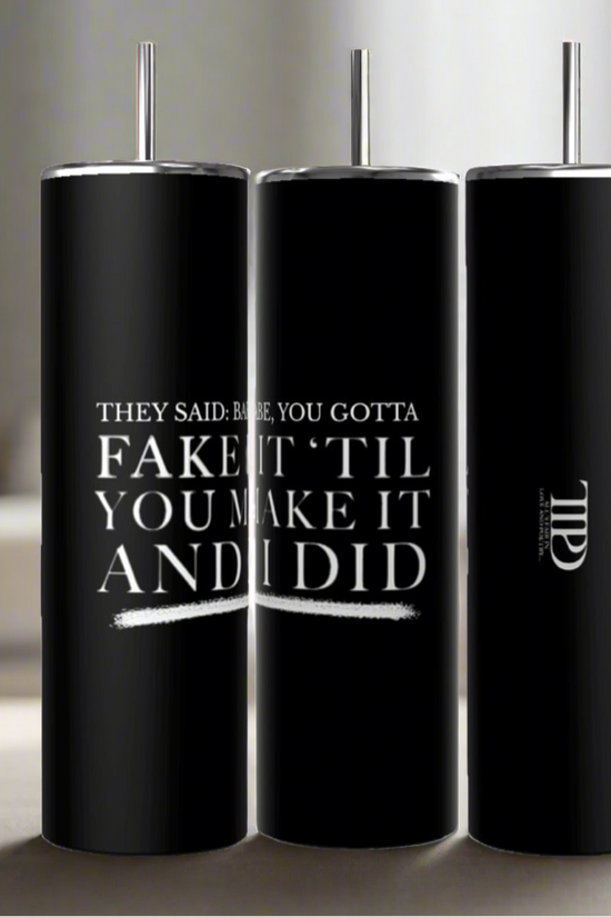 Three Gotta Fake It | TTPD 20oz Tumblers by Kreative Kreationz with black stainless steel bodies and silver lids and straws are placed side by side. The front tumbler reads, 