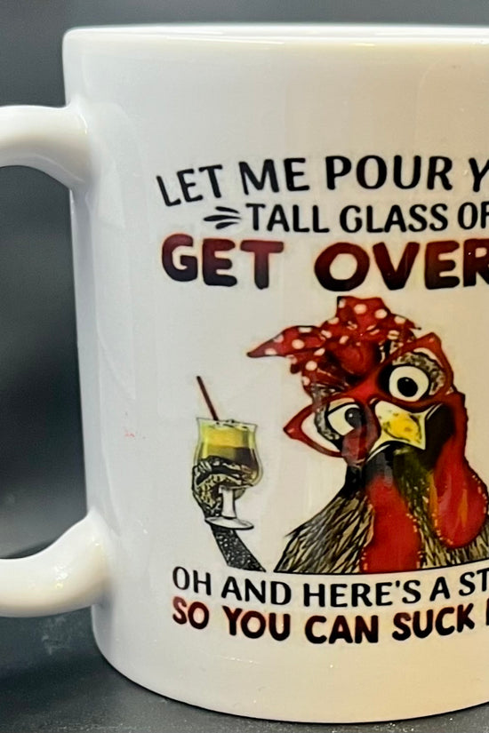 The Chicken Ceramic Mug by Kreative Kreationz features an adorable illustration of a chicken wearing a red bandana and glasses, holding a yellow drink and straw. The text humorously reads, 