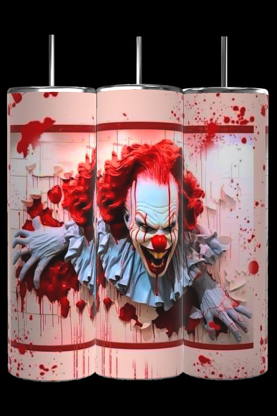 A set of three 20 oz tumblers from the Kreative Kreationz IT Halloween Series features a menacing clown with red hair and face paint, emerging through a blood-spattered background. The design shows the clown tearing through a white textured surface, enhancing the horror theme. Each tumbler includes a spill-proof lid.