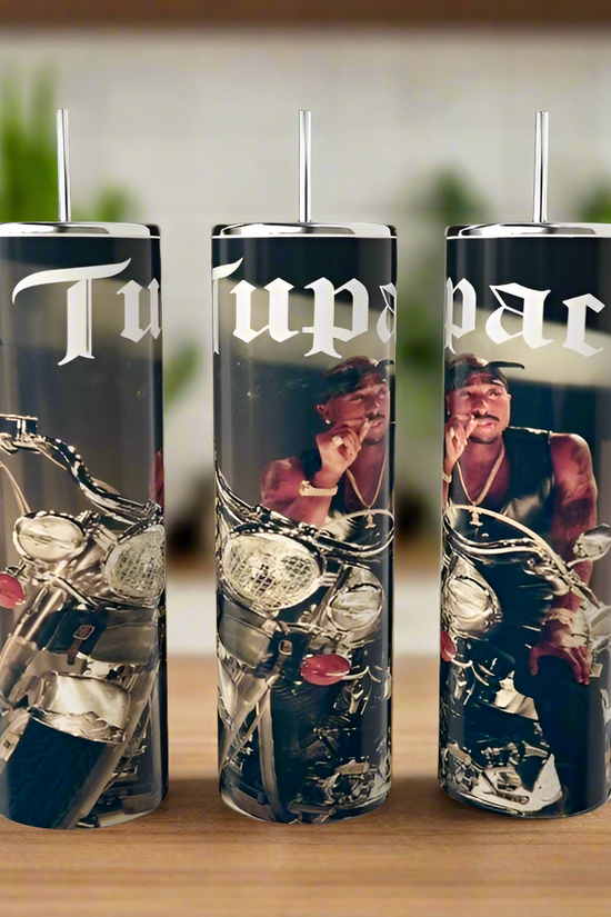 Three 20oz stainless steel tumblers from Kreative Kreationz stand on a wooden surface, each featuring a man in a bandana on a motorcycle with 