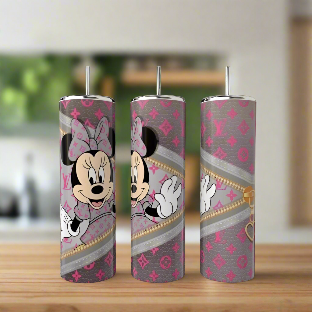 Three 20oz stainless steel tumblers from Kreative Kreationz's Mickey Mouse LV Peek-a-Boo Collection, featuring Minnie Mouse with pink bows, chic gray and pink backgrounds, and faux gold zippers on a wooden surface with a blurred kitchen backdrop.