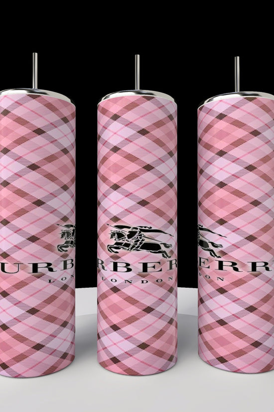 Three pink plaid hot water bottles with metal caps, featuring a black logo and 