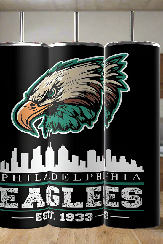 Three black Kreative Kreationz EAGLES - Football 20oz Skinny Tumblers feature the Philadelphia Eagles logo, eagle head above city skyline, and 