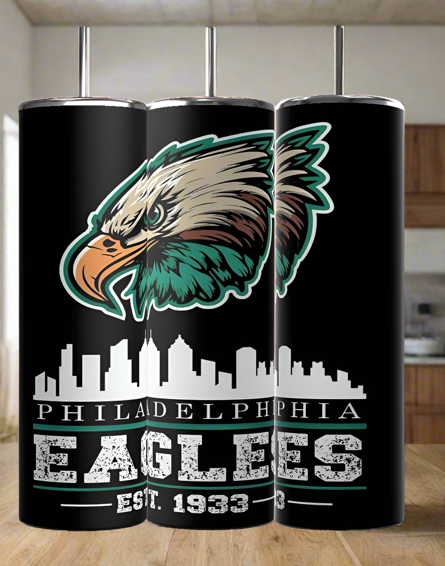 Three black Kreative Kreationz EAGLES - Football 20oz Skinny Tumblers feature the Philadelphia Eagles logo, eagle head above city skyline, and "PHILADELPHIA EAGLES EST. 1933" in white and green—ideal eco-friendly drinkware for fans.