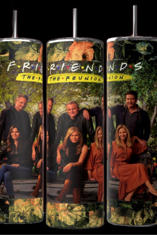 Three cylindrical tumblers are displayed against a black background. Each Kreative Kreationz The Reunion Friends TV Show 20oz Tumbler features an image of a group of people sitting and standing in front of a lush, green background with the text 