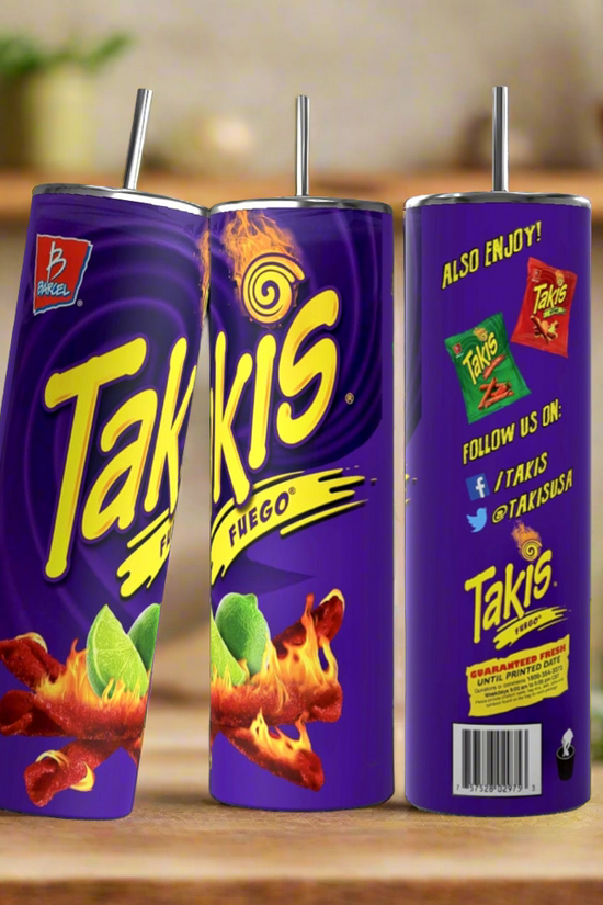 Image of three cylindrical cups with metal straws, designed to resemble Takis Fuego snack packaging. The Takis 20oz Stainless Steel Skinny Tumblers from Kreative Kreationz display the Takis logo, fiery snack sticks, and lime slices on a purple background. With a 20 oz capacity, they keep beverages hot or cold. Blurred kitchen background.