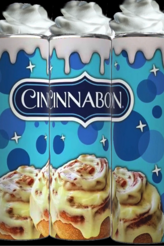 Three Kreative Kreationz Cinnabon 20oz Tumblers with Removable Lid Toppers, designed with whipped cream accents, stand side by side. The blue background showcases the Cinnabon logo and features illustrations of signature cinnamon rolls with icing dripping down the sleek design of each tumbler.