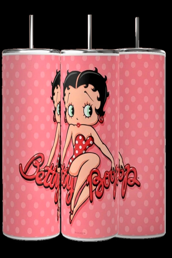 The Betty B 20oz Skinny Tumblers from Kreative Kreationz feature three pink polka-dotted designs with a black-haired woman in a red polka-dot swimsuit, accompanied by 