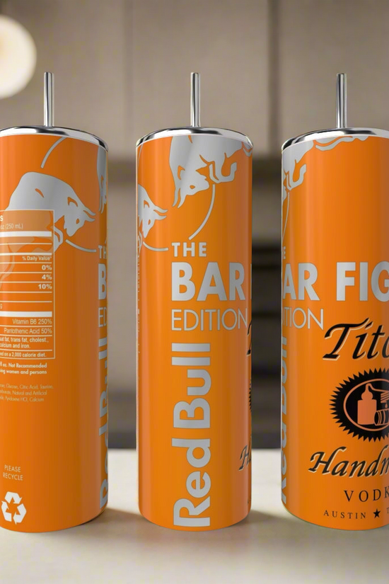 Three orange Kreative Kreationz Bar Fight Edition Titos Red Bull 20oz Tumblers, each with a metal straw, are displayed on a counter, showcasing clear branding, nutritional info, and eco-friendly recycling symbols.