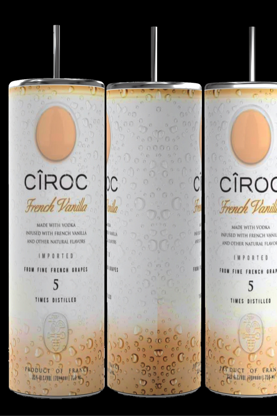 Two cans of Kreative Kreationz Ciroc 20oz Tumbler with 3D Lid Topper are shown on a wooden surface, reminiscent of travel tumblers. The left can is Red Berry flavor, topped with ice and a cherry. The right can is Vodka Snap Frost flavor, topped with ice and a lemon slice. Both cans feature product information and branding.