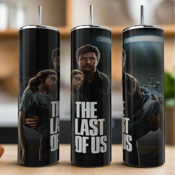The Last Of Us 20oz Skinny Tumbler by Kreative Kreationz features dramatic character graphics and the series logo. This stylish, eco-friendly stainless steel tumbler adds a luxury touch to your kitchen for everyday use.