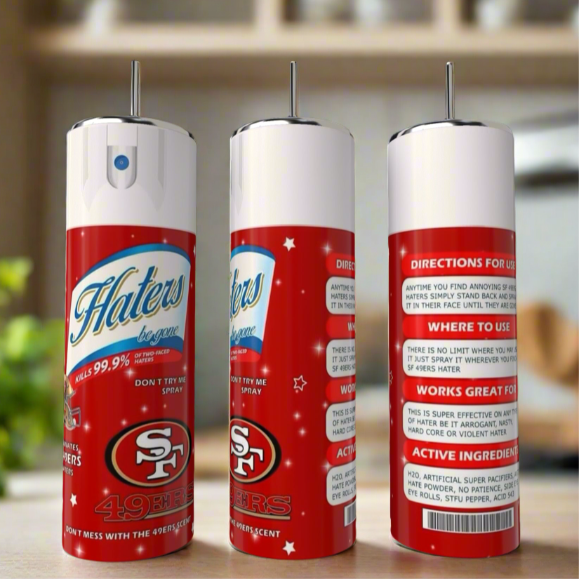 Three novelty spray cans with San Francisco 49ers logos sit on a kitchen counter next to a Kreative Kreationz SF 49ers Haters 20oz Tumbler. The cans display playful instructions and vibrant red, white, and blue designs.