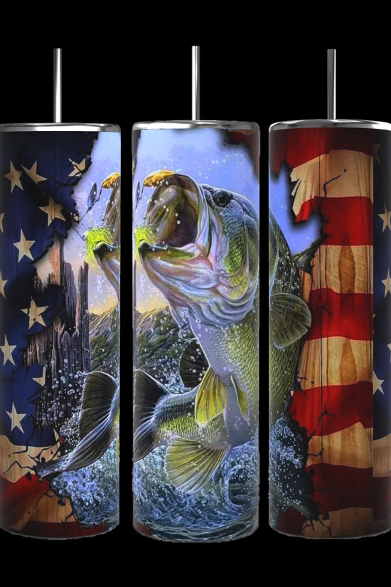 Three 20 oz capacity Fish n Flag Stainless Steel Tumblers by Kreative Kreationz, featuring vibrant American flag designs with a distressed, torn look and dynamic depictions of large-mouth bass fish leaping out of the water amid splashes and underwater scenes. These tumblers keep beverages hot or cold.