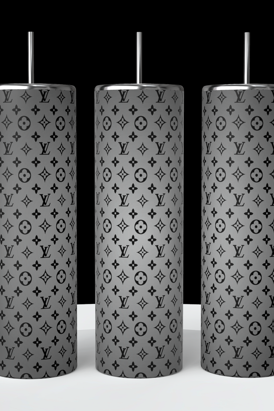 The LV Ombre 20oz Skinny Tumblers from Kreative Kreationz feature a black and gray monogram pattern on a white backdrop set against a black background. Each double-wall stainless steel tumbler is equipped with a straw, offering both style and functionality.