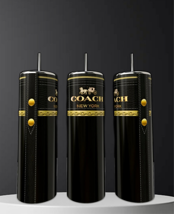 Three Coach 20oz Skinny Tumblers by Kreative Kreationz, sleek and black with gold accents and straws, display the "Coach New York" logo—stylish, eco-friendly drinkware ideal for luxury lovers.