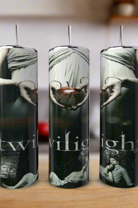 Three tumblers with 'Twilight' design on a wooden surface.