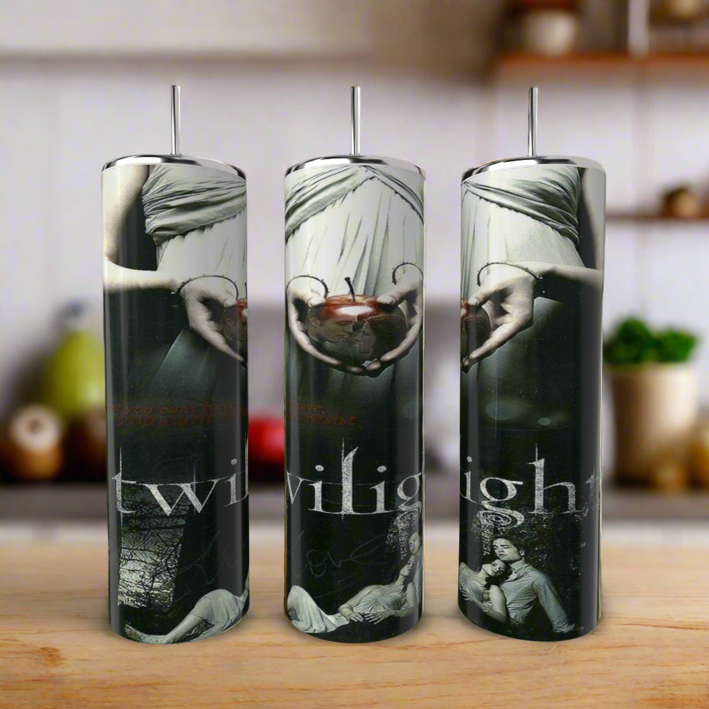 Three tumblers with 'Twilight' design on a wooden surface.