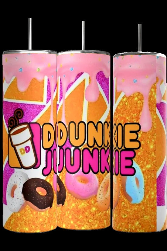 These Dunkin Junkie Drip 20oz Tumblers by Kreative Kreationz are vibrantly handmade and adorned with donut images and dripping pink frosting. The phrase 