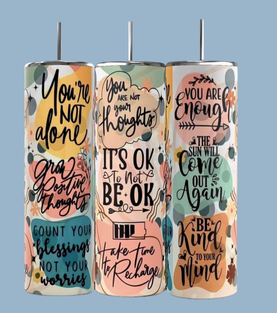 Discover the "It’s Ok Not To Be Ok Affirmations 20oz Skinny Tumbler" by Kreative Kreationz—a trio of stainless steel tumblers. Featuring quotes: "You're not alone," "You’re not your thoughts," and "You are enough," these eco-friendly treasures inspire with colorful floral designs.