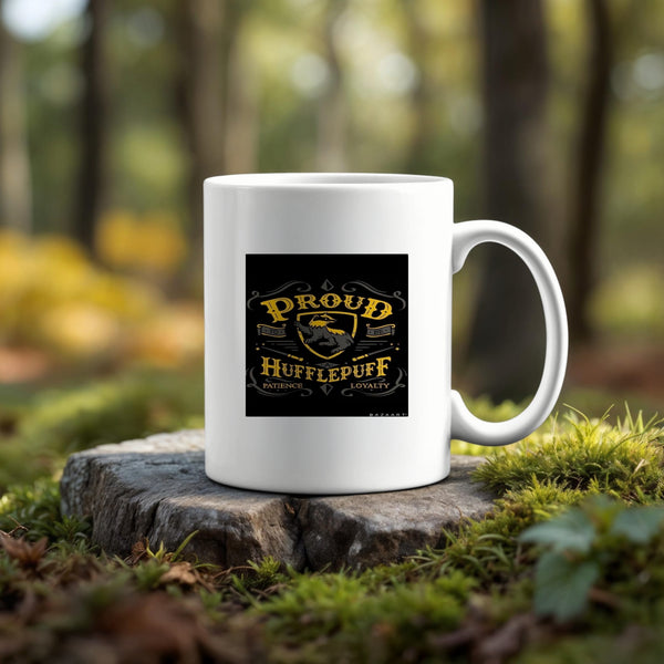 The Proud Hufflepuff Ceramic Mug by Kreative Kreationz, with an 11 oz capacity and “Proud Hufflepuff. Patience. Loyalty.” design, sits on a tree stump outdoors—an eco-friendly choice for Harry Potter fans.