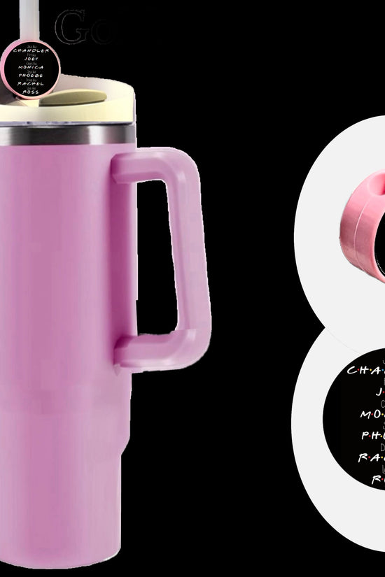 A tall pink insulated travel mug with a handle features the Friends Straw Topper by Kreative Kreationz—a personalized silicone round straw topper. Engraved names from the TV show 