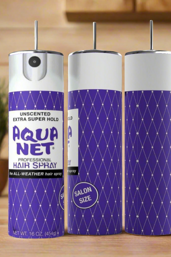 Three Aqua Net unscented extra super hold hairspray cans are shown on a wooden surface with a Kreative Kreationz Aqua Net 20oz Tumbler made from BPA-free reusable materials. The cans’ front, back, and side are visible.