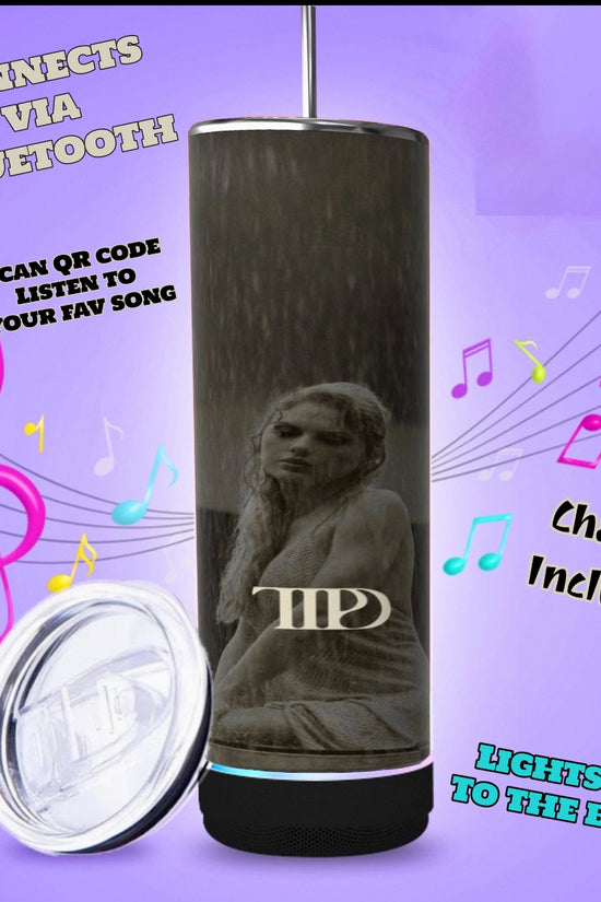 Three TTPD Bluetooth Tumblers by Kreative Kreationz, featuring a black cylindrical design with pink bases, are displayed. Each tumbler showcases a statue motif and the initials 