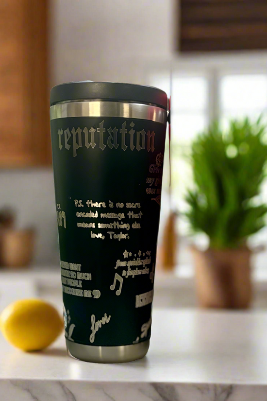 The Kreative Kreationz Taylor Swift Eras 20oz Engraved Tumbler sits on a kitchen counter, personalized with 