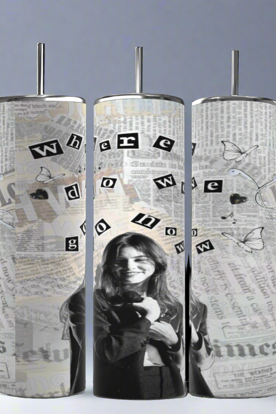 Three tall tumblers are shown against a gray backdrop. Each 20 oz capacity Gracie Abrams NY Times Music Skinny Tumbler by Kreative Kreationz is decorated with black-and-white images of a smiling woman, newspaper clippings, and scattered butterfly illustrations. The words 