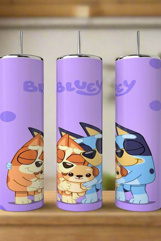 Three purple 20 oz Kreative Kreationz Bluey stainless steel tumblers, featuring sublimated designs of cartoon dogs hugging and 