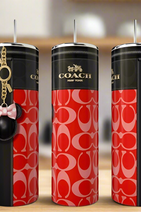 The Coach Red Minnie 20oz Skinny Tumbler by Kreative Kreationz is a stainless steel, eco-friendly tumbler featuring red and pink Coach logo patterns, black stripes, metal straw, and comes with a Minnie Mouse keychain or Coach leather tag.