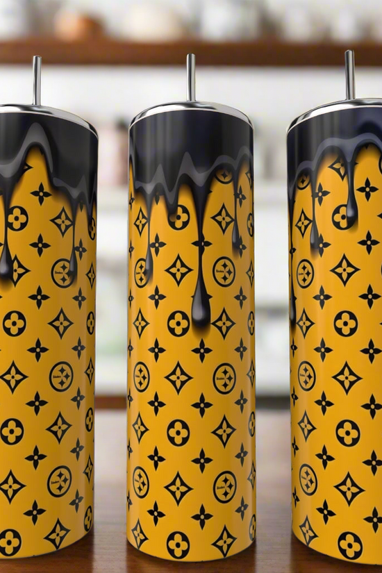 Three Steelers LV Drip - 20oz Skinny Tumblers by Kreative Kreationz, featuring tall yellow stainless steel with black drip and geometric patterns, stand side by side—a bold, eco-friendly drinkware choice.