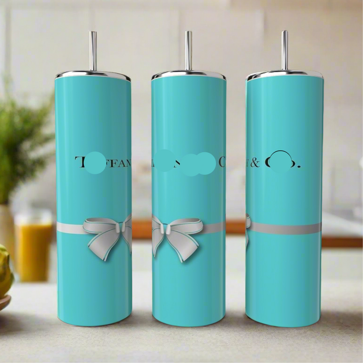 Three tall, turquoise Kreative Kreationz 