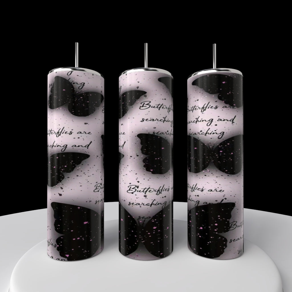 A 20oz Louis Vuitton tumbler by Kreative Kreationz with a luxury-inspired design is displayed on a round white platform—eco-friendly, reusable, and set against a dramatic black backdrop.
