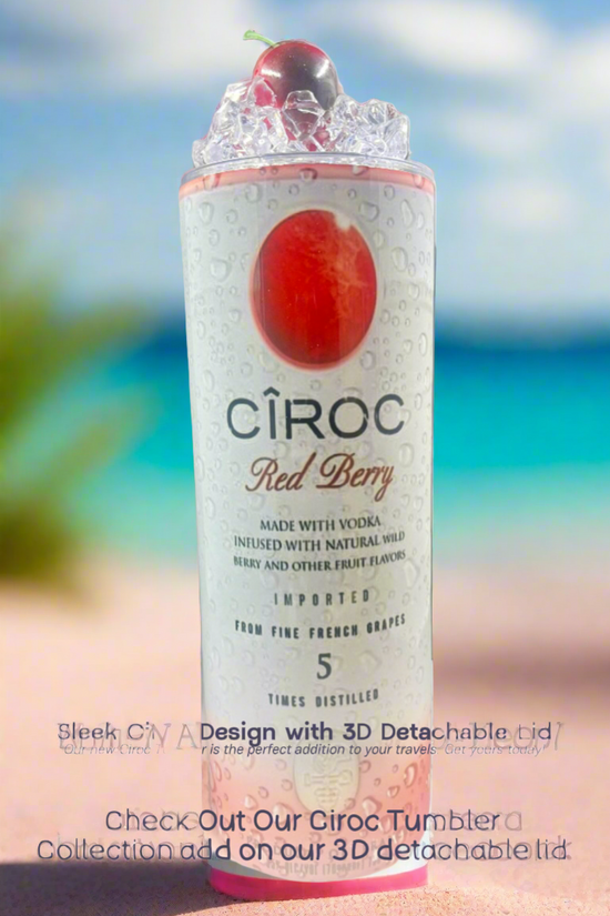 Two cans of Kreative Kreationz Ciroc 20oz Tumbler with 3D Lid Topper are shown on a wooden surface, reminiscent of travel tumblers. The left can is Red Berry flavor, topped with ice and a cherry. The right can is Vodka Snap Frost flavor, topped with ice and a lemon slice. Both cans feature product information and branding.