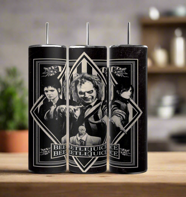 The Beetlejuice 20oz Tumbler by Kreative Kreationz features luxury-inspired black and white movie character designs, including Beetlejuice in the center, perfect for display on your kitchen counter.