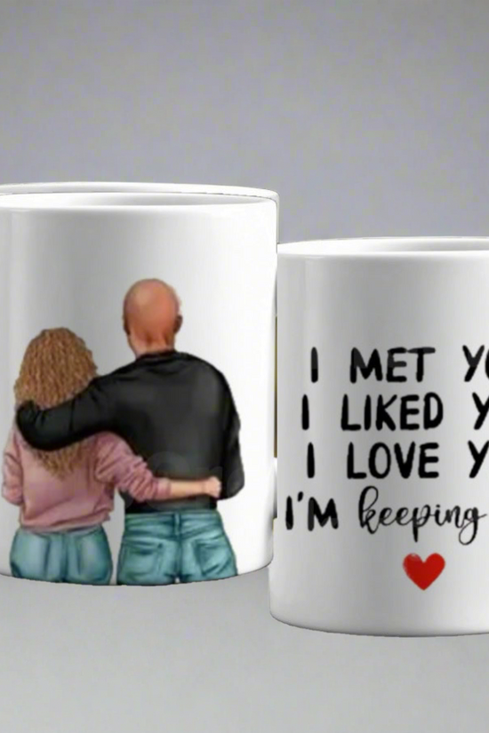 The Couples Ceramic Mug by Kreative Kreationz is a perfect romantic gift, featuring one mug with a couple embracing from behind, and the other stating 