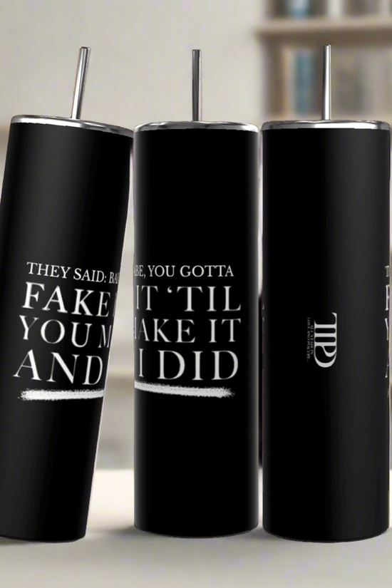 Three Gotta Fake It | TTPD 20oz Tumblers by Kreative Kreationz with black stainless steel bodies and silver lids and straws are placed side by side. The front tumbler reads, 
