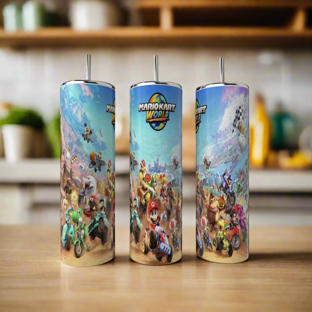 Kreative Kreationz Mario World 20oz Tumblers, made of stainless steel, feature vivid racing scenes with Mario Kart characters. Each eco-friendly tumbler includes a metal straw and is shown on a wooden surface in a bright kitchen setting.