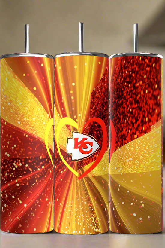 The Chiefs Heart 20oz Tumbler by Kreative Kreationz features a sparkling red and gold design with heart shapes and the team's logo—an eco-friendly must-have drinkware for Kansas City Chiefs fans.